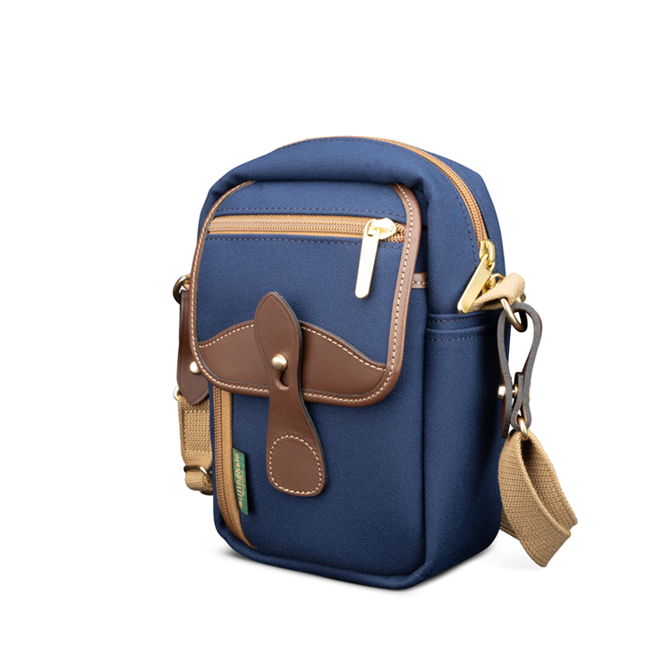 Airline Stowaway Navy FibreNyte Chocolate Leather Front