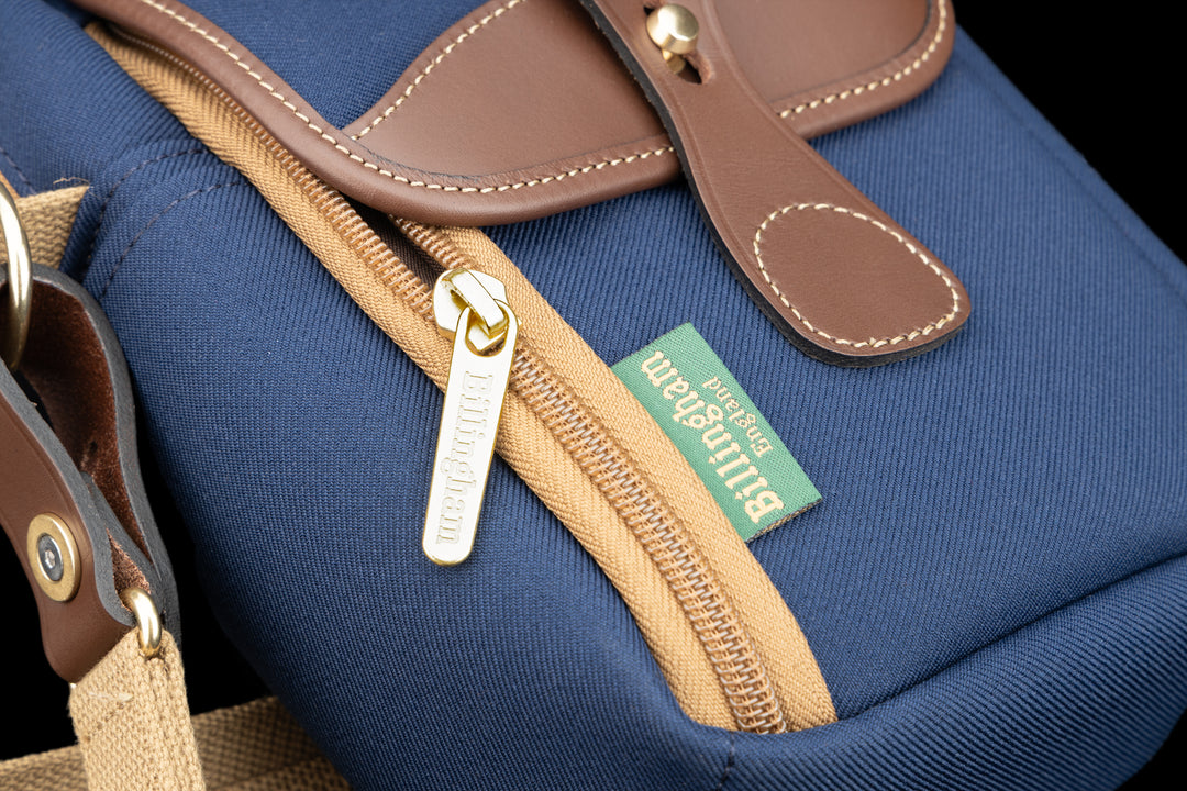 Airline Stowaway Navy FibreNyte Chocolate Leather Front Zip Pocket
