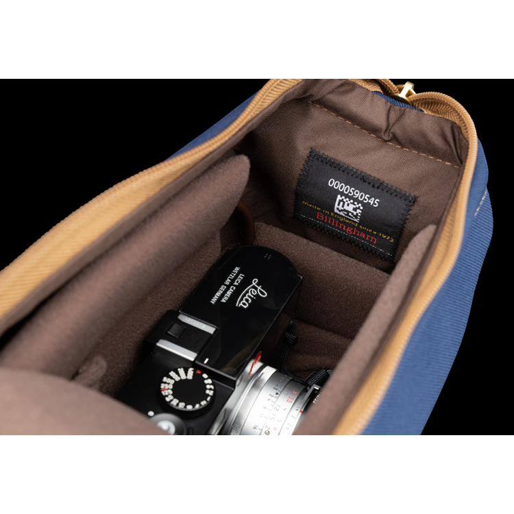 Capsule 1 Navy FibreNyte Chocolate Leather with camera inside