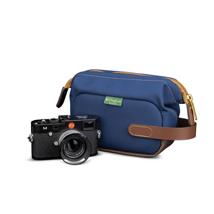 Capsule 1 Navy FibreNyte Chocolate Leather Front with Leica camera
