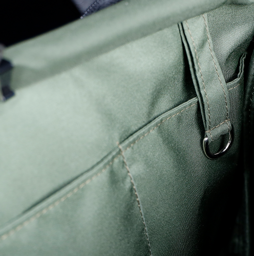 Two pockets and brass key loop inside Key Grip