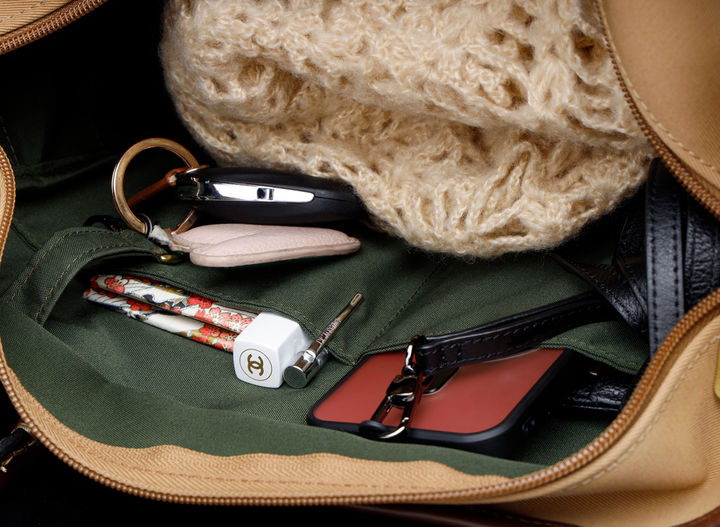 Internal pockets and brass key loop inside Key Grip