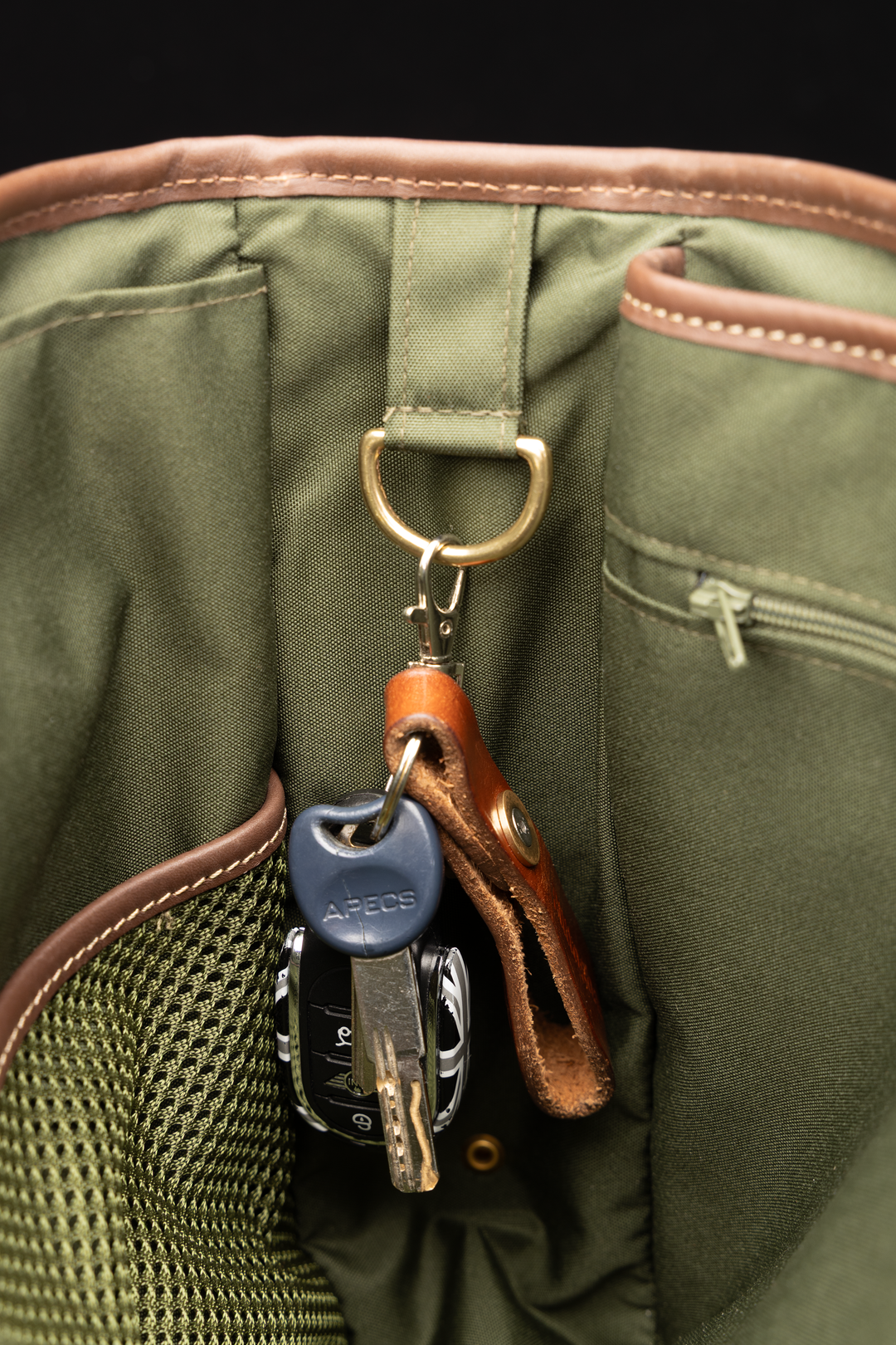 Brass key loop inside Icon Messenger Bag