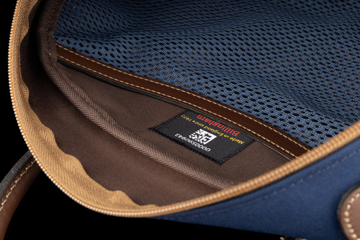 Overnighter Navy FibreNyte Chocolate Leather Internal mesh pocket