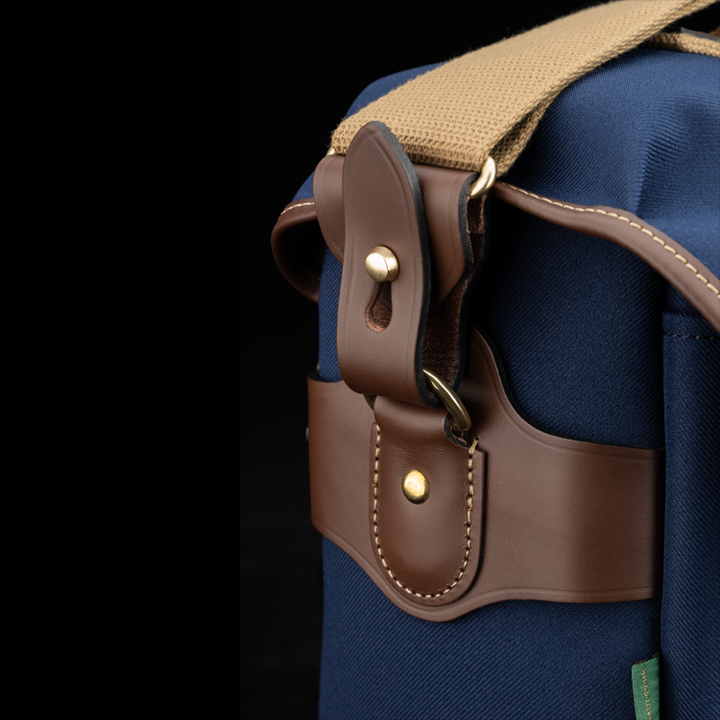Hadley One Side Close Up Navy FibreNyte Chocolate Leather